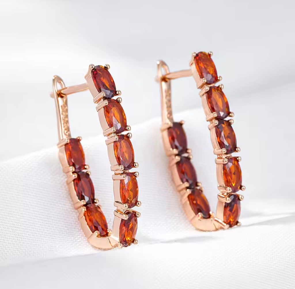 [S162] Arete Arracada Granate de acero con baño de Oro Rosa