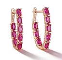 Arete Arracada Rosa Rubi de acero con baño de oro rosado